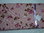 Coupon de tissus patch fleur coloré sur fond rose 150*50cm